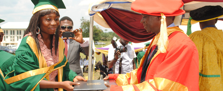 Graduating Student Ms Mfreke Ukpong receiving her certificate from the Chancellor.